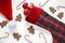 Gym dumbbells in Christmas stocking, gingerbread man cookies, candy canes and Santa Claus hat.