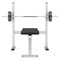 Gym flat weight bench with barbell on white