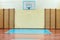 Gym for sports classes at school or College. Swedish wall, stairs, and wooden floor with markings for volleyball