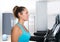 Gym treadmill women indoor exercise blue eyes