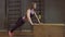 Gym woman push-up strength pushup in a fitness workout