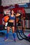 Gym woman with weighted ball and rope