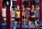 Gym women with barbell and kettlebell workout