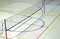 Gymnasium indoor sports badminton net white floor lines playground