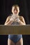 Gymnast Applying White Chalk To Hands