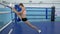 Gymnast do stretching during training before competition in sports Complex