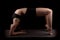 Gymnast elbows toes backward bend