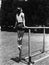 Gymnast on parallel bars outside