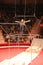 Gymnast performing unimaginable tricks on horizontal bars in circus