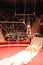 Gymnast performing unimaginable tricks on horizontal bars in circus