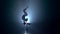 Gymnast performs tricks on the table in the studio . Smoke background. Slow motion. Silhouette