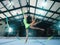 Gymnastics, motion blur and ribbon dance with a woman in a gym training for the olympics competition. Fitness, art and