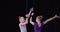 Gymnastics performance on stage, two girls during an aerial gymnastics show, 4k