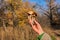 Gymnopilus junonius mushrooms in hand. Types of mushrooms in a mixed forest.