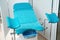 Gynecological examination chair in doctor`s office