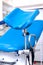 Gynecological room gynecologist chair equipment tool blue white clinic hospital