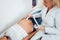 A gynecologist examines a pregnant woman. Fetal doppler heart auscultation.