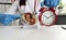 Gynecologist fetus child clock alarm clock in clinic female age and fertility