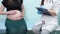 Gynecologist interviews pregnant lady in clinic office