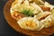 Gyoza Chinese Dumplings on Wood Plate, Fried Vegetable Jiaozi Macro, Chicken Momo Pile, Asian Gyoza Closeup