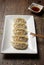 Gyozas, fried japanese dumplings served with soy sauce.