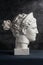 Gypsum copy of ancient statue Diana head on a dark textured background. Plaster sculpture woman face.