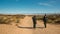 gypsum desert in New Mexico, rangers lead a group of tourists to a dry Lucero lake in a valley near the mountains in New Mexico