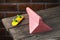 Gypsum ramp in pink color and yellow fingerboard on a wooden table