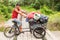 Gypsy boy riding on a bicycle