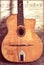 Gypsy Jazz Acoustic Guitar Vintage and Worn  with Wear and Music Notes Wallpaper