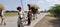 Gypsy Man with Caravan on Urban Roads