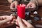 A Gypsy woman guesses a love match using wedding rings and fortune-telling cards by candlelight.Fortune telling with wedding rings