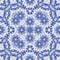 Gzhel printing on tiles or ceramic dishes. Symmetrical seamless pattern of petals and flowers geometric folk ornament