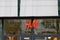 H&M logo brand windows facade entrance and text sign front of store H & M retail