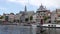 Haarlem embankment on Spaarne river overlooking weighing house Waag and Reformed Protestant church Grote Sint-Bavokerk