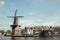 HAARLEM, NETHERLANDS, AUGUST 2019: Medieval Adriaan windmill in Haarlem, the Netherlands in summer