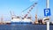 Habour with vessel ships and a parking sign on the pier in Bremerhaven, Germany