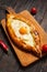 Hachapuri on Adjara. Beautiful open pies khachapuri with egg