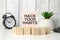 hack your habits words with clock with wooden blocks