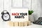 hack your habits words with clock and wooden blocks