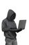 Hacker with anonymous mask with laptop while standing