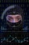 Hacker with balaclava over a screen with binary code