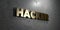 Hacker - Gold sign mounted on glossy marble wall - 3D rendered royalty free stock illustration