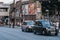 Hackney carriage black cabs outside London Bridge Station, UK