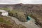 Hafragilsfoss waterfall near Dettifoss at Jokulsa a Fjollum river in Iceland with dirty waters and amount of clean azure liquid