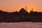 Hagia Sophia, the most important tourist attraction of Istanbul, Turkey, silhouetted against the twilight sky from across the Bosp