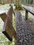 Hail on a park bench after heavy rainfall and stormy weather with hail storm and icy raindrops show need for insurance dangerous