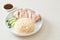 Hainanese chicken rice or rice steamed with chicken soup