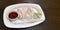 Hainanese chicken rice set in paper plate, Save world recycle di