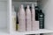 Hair Brazilian Keratin treatment therapy cosmetics bottles on shelf in beauty salon. Brazilian Keratin Hair Treatment Complex.